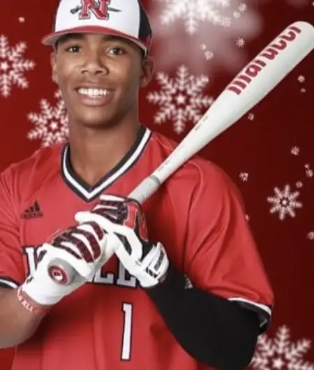 Quade Smith in a Nicholls State uniform holding a bat